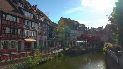 Water-Canal-in-La-Petite-Venise-among-colourful-half-timbered-houses-on-a-Sunny-Evening-in-Colmar