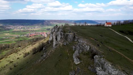 Walberla-Hill-Drone-Video-of-Cliff-and-Chapel-during-a-sunny-day