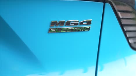 Mg-4-Elektroauto,-Ladestation,-EV-Technologie,-Logo