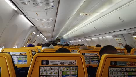 Travelers-aboard-a-budget-friendly-Ryanair-flight-departing