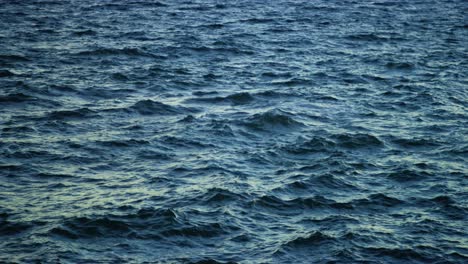 Open-ocean-waves-crashing-at-sea