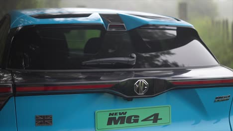 MG-4-Electric-car,-charging-station-,-auto-spoiler,-EV-technology