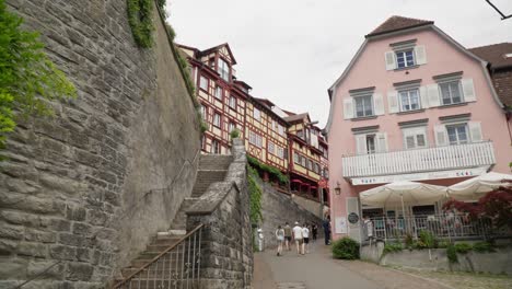 Walking-through-Meersburg-old-town,-past-colorful-half-timbered-houses-and-quaint-streets,-daylight