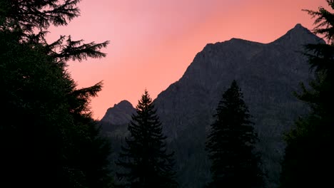 Pink-sunset-over-Mount-Cannon-in-Glacier-National-Park,-time-lapse