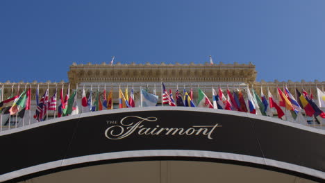 The-Façade-of-the-Fairmont-Hotel-Adorned-with-International-Flags-in-San-Francisco,-California---Close-Up
