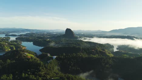 Colombia-Landscape-with-El-Penon-de-Guatape-Mountain,-Aerial-with-Blue-Sky-Copy-Space
