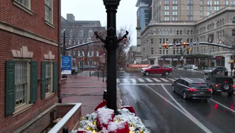 Christmas-wreath-decorated-on-lantern-in-american-city-of-Lancaster-at-snowstorm