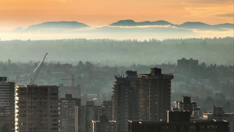 West-End-Vancouver-Skyline-And-Mystic-Landscape-In-Fog-At-Sunset-In-British-Columbia,-Canada