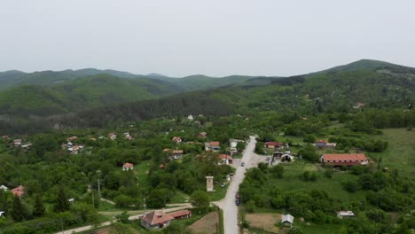 Approaching-drone-shot-of-Tsarichina-Village,-a-place-famous-for-sightings-of-extraterrestial-and-paranormal-activities-in-Bulgaria