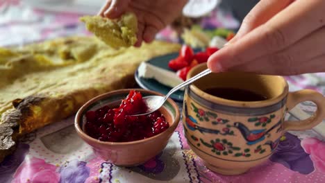 Barberries-jam-delicious-berry-jam-sweet-tart-taste-breakfast-syrup-red-bright-tasty-food-with-avocado-peanut-butter-taste-the-persian-cuisine-in-middle-east-mountain-rural-countryside-khorasan-iran
