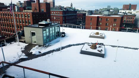 Snowy-Rooftop-view-of-downton-Portland,-Maine