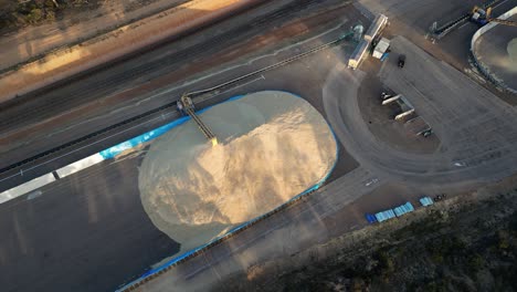 A-grain-truck-being-unloaded-through-pipes-into-a-huge-silo-in-western-Australia
