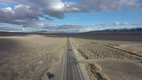 Car-driving-on-highway-50-across-Nevada,-loneliest-road-in-America