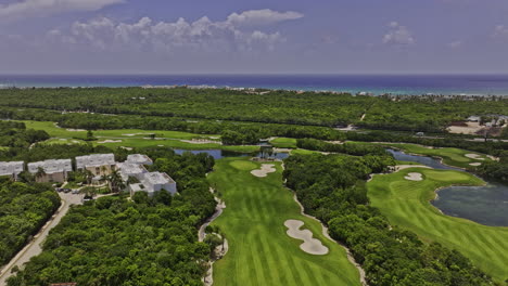 Akumal-Mexico-Aerial-v21-drone-flyover-Riviera-Maya-Golf-Course-capturing-country-club-and-luxury-residences-by-Gran-Bahia-Principe-with-ocean-views---Shot-with-Mavic-3-Pro-Cine---July-2023