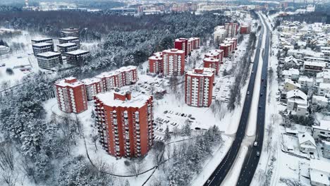 Brown-snow-covered-building-apartment-complex-outside-Vilnius-Lithuania-in-winter