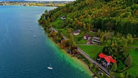 Enchanting-Attersee-Lake-unfurls-its-pristine-shores,-embraced-by-charming-town-of-Austria