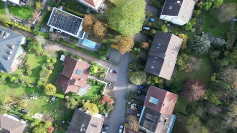 Top-down-drone-shot-flying-along-a-typical-street-in-Heidelberg