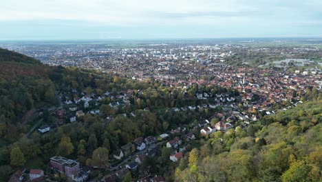 Pull-away-drone-shot-of-Handschuhsheim,-flying-above-town