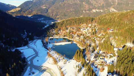 Aerial-4K-drone-footage-of-lake-Jasna,-Slovenia-in-the-winter