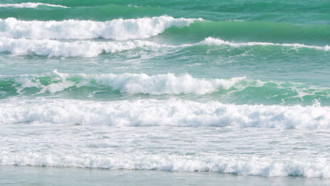 Foamy-Emerald-Color-Sea-Waves-Crashing-Over-Sandy-Beach-in-Da-Nang,-Vietnam