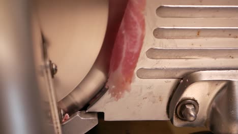 Hand-Slice-Raw-Meat-with-Slicer,-Close-Up
