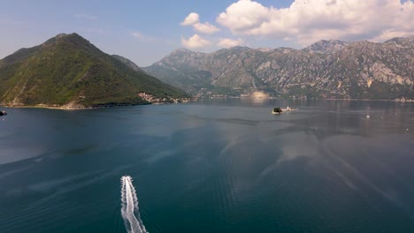 Kotor-Bay-From-Above-With-Speeding-Boat-With-Mountains-On-Background
