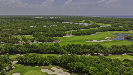 Akumal-Mexico-Aerial-v16-flyover-and-around-Riviera-Maya-Golf-Course-capturing-Gran-Bahia-Principe-luxury-complex-surrounded-by-lush-jungle-and-ocean-landscape---Shot-with-Mavic-3-Pro-Cine---July-2023