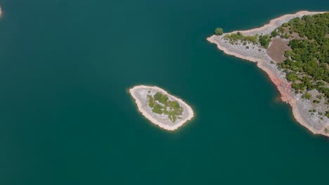 Aerial-Drone-Shot-Zoom-In-Top-View-Island-In-Slansko-Lake,-Montenegro
