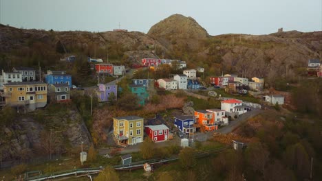 Brightly-colored-homes-built-into-the-side-of-a-hill-in-St