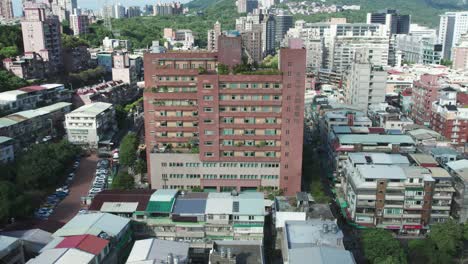 Aerial-Shot-of-Guandu-Medical-Center-Amidst-Taipei's-Landscape