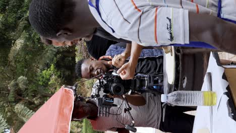 The-Crew-is-Preparing-the-Film-Set-for-the-Shooting-of-a-Commercial-Video---Vertical-Shot