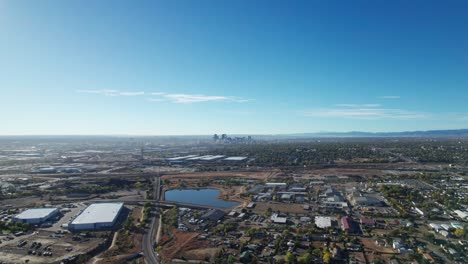 Far-away-distant-drone-shot-flying-towards-downtown-Denver,-Colorado