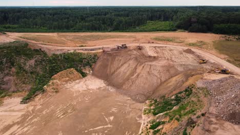 Gravel-extraction-in-local-quarry,-aerial-drone-view