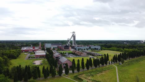 Massive-industrial-complex-with-tower-in-Netherlands,-aerial-drone-view