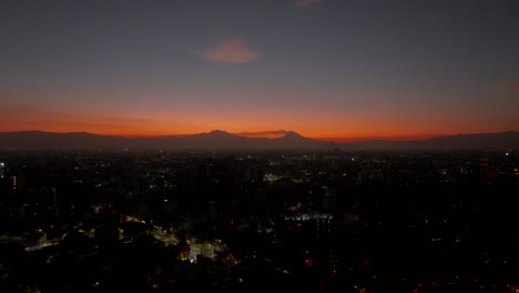 Colorful-Shot-Of-Distant-Volcano-In-Iztaccihuatl-At-Sunrise,-Mexico-City