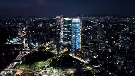 Flying-Over-Marvelous-Reforma-Avenue-In-Mexico-City-At-Night-Time,-Residential-Area-View