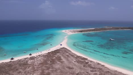 Cayo-de-Agua-sand-isthmus-island-surrounded-by-clear-light-blue-ocean-water
