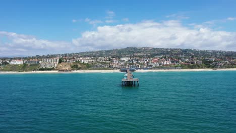 4k-Aerial-Video-flying-towards-San-Clemente-Pier,-California,-with-sunny-blue-skies,-2023