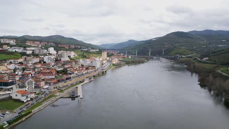 Douro-River-Leading-to-Peso-da-Régua,-Portugal---aerial