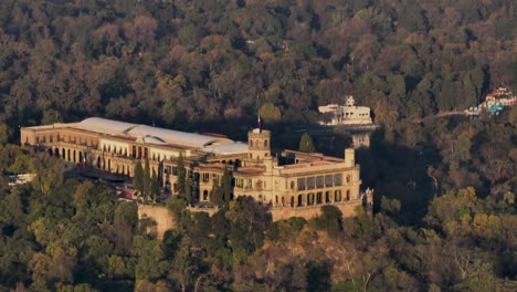 Orbit-Shot-Of-Historical-Chapultepec-Castle-In-Heart-Of-Green-Forest-In-Mexico-City