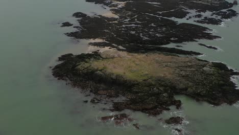 Dynamic-aerial-pan-and-scan-reveal-of-Ireland's-Eye-island