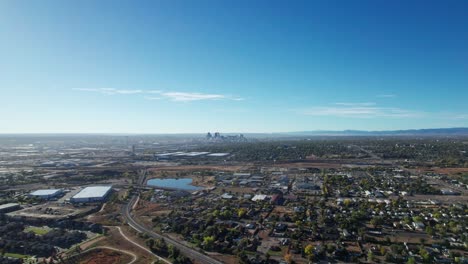 Drone-aerial-view-flying-to-the-left-of-downtown-Denver-skyline