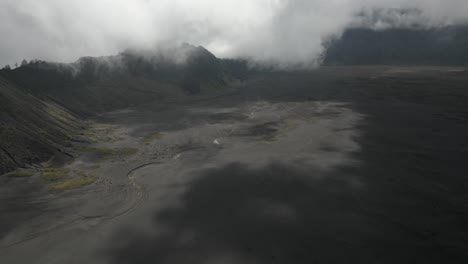 Flyover-of-volcanic-ash-caldera-at-Mt-Bromo-in-Java,-Indonesia