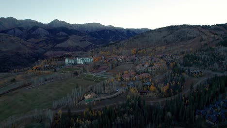 Drone-shot-flying-in-towards-mountain-village-in-telluride-colorado-in-the-fall