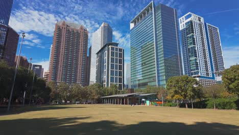 Open-grass-area-in-Discovery-Green-park-in-Houston-on-a-sunny-day
