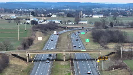 Traffic-on-american-highway-in-Rural-Landscape-in-winter-season