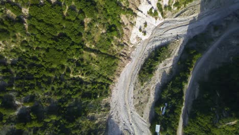 Top-down-drone-shot-flying-over-the-Girdimanchay-river-near-Lahic-in-Azerbaijan
