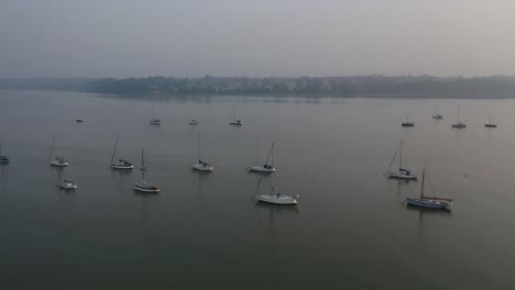 aerial-flight-moving-from-the-river-orwell-to-the-shore-in-mist-at-sunrise