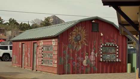 Small-red-barn-in-Sedona,-Arizona-with-stable-video-shot