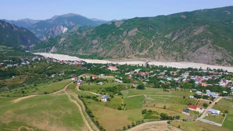 Drone-shot-flying-over-the-town-of-Lahic-in-Azerbaijan-while-panning-up-and-to-the-left